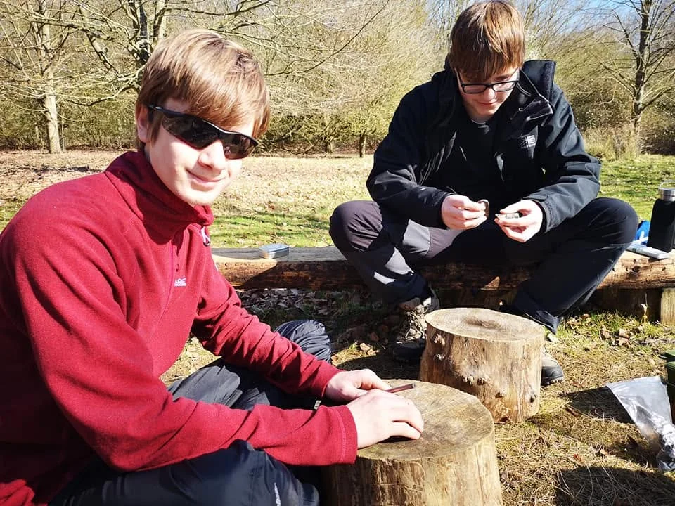 Young people learning practical skills together